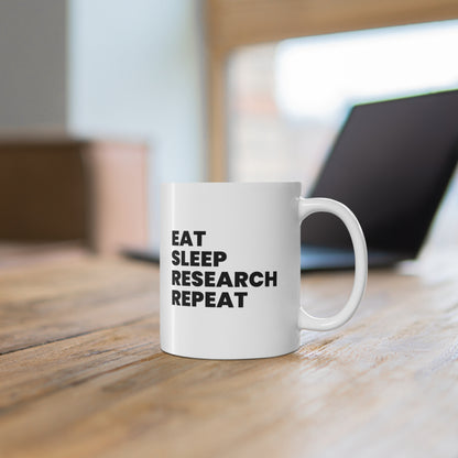 ceramic mug with quote: Eat Sleep Research Repeat