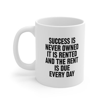 Success is never owned it is rented and the rent is due every day Coffee Mug