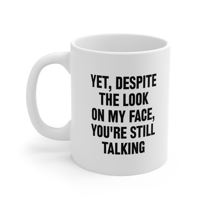 Yet despite the look on my face you're still talking Coffee Mug 